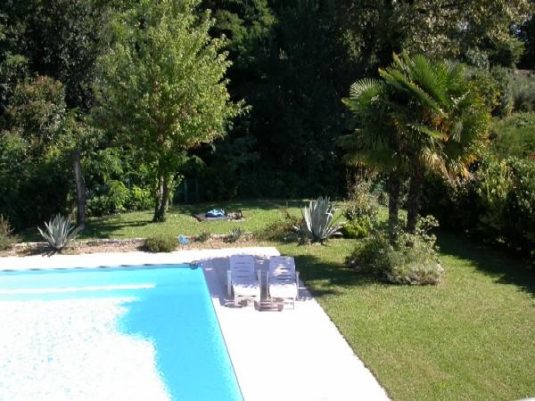 Villa con piscina e giardino vista lago 4